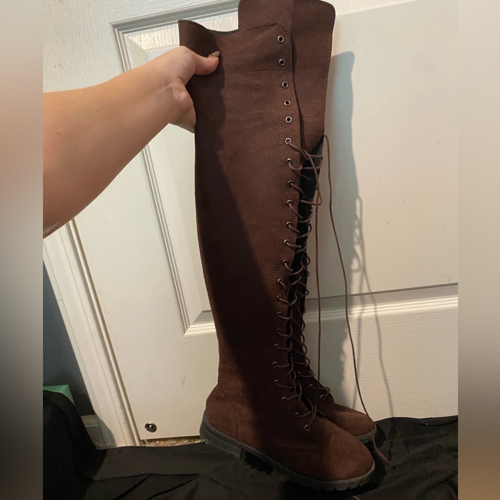 Knee high brown lace up boots